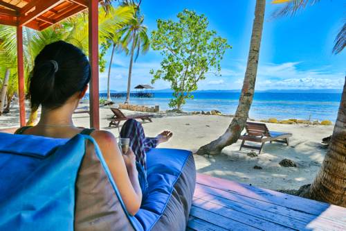 relax on the Villa Porch and drink facing the ocean view and beach at Yeben Island